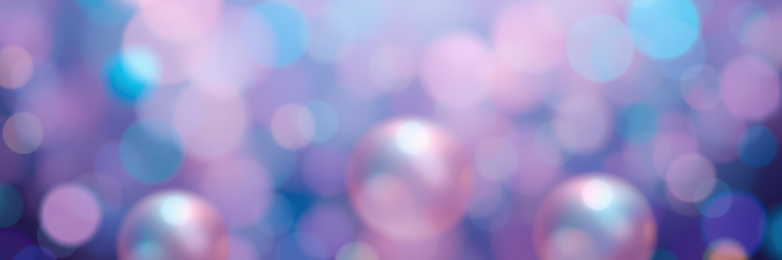 Colorful bokeh background with shimmering lights creating a festive atmosphere